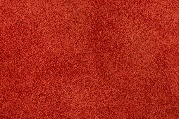 istock Suede in a warm shade of red as a background. 2193179108