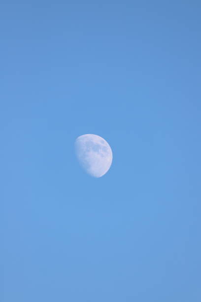 The moon during the day time on a clear day