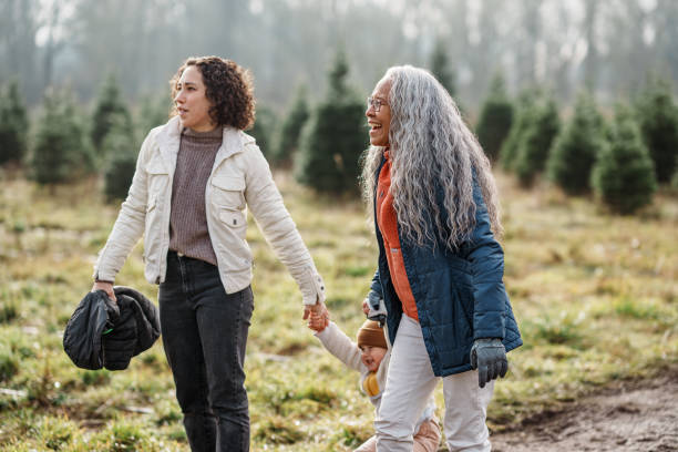 istock Multi-generation family visiting you-cut Christmas tree farm 2193180148