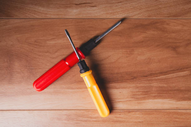 set of construction tools on the wooden background