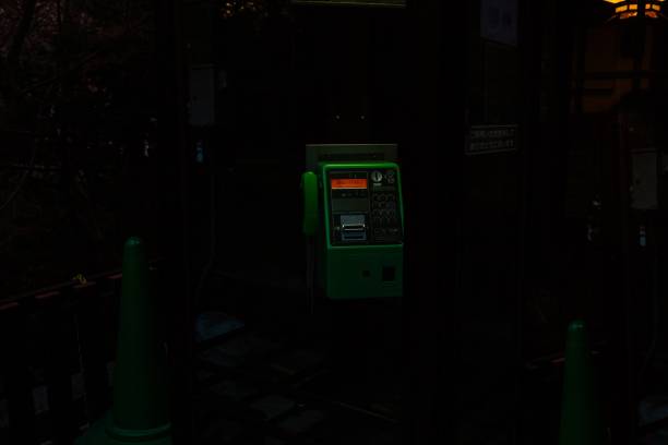 istock Green phone booth in a temple at night in Japan 2193181671