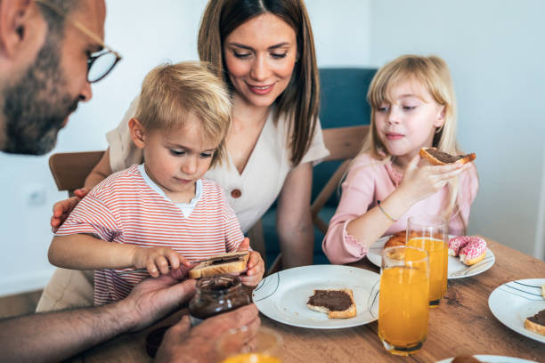 istock Happy family having breakfast 2193187296