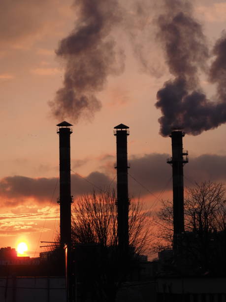 istock smoke from factory chimneys against red sky 2193188532