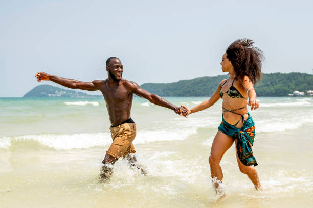 istock Joyful Couple Enjoying Summer Beach Vacation Together 2193188786