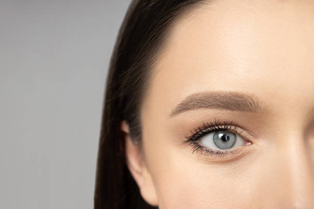 istock Attractive young girl on a gray background. Botox concept 2193190074