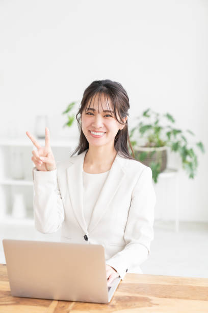 istock young asian businesswoman using laptop 2193190723