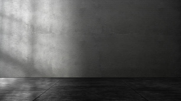 istock Black wall with plastered concrete floor. Abstract pattern of a cement wall 2193196003