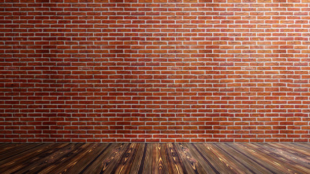 istock Red wall with wooden floor. Abstract pattern of a brick wall 2193196591