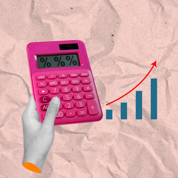istock The human hand shows an increase chart and a calculator with a percentage symbol 2193198031