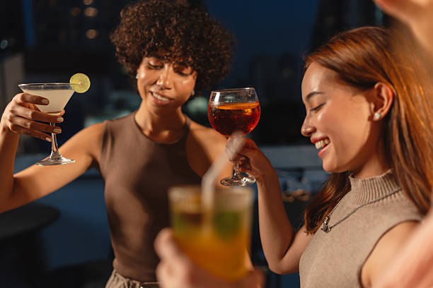 istock Women toasting at a rooftop party 2193198081