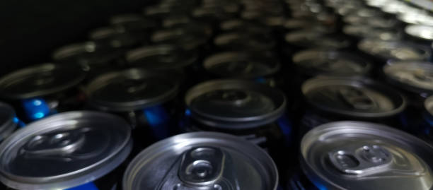 istock Energy drinks in aluminum cans on a shelf. Unfocused photo for text. Energy drinks with caffeine content. Cans of non-alcoholic beer. 2193199426