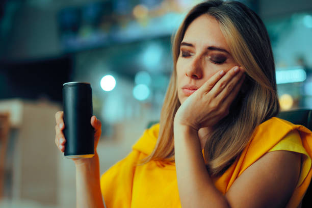 istock Woman Drinking Soda Suffering from a Toothache 2193201089