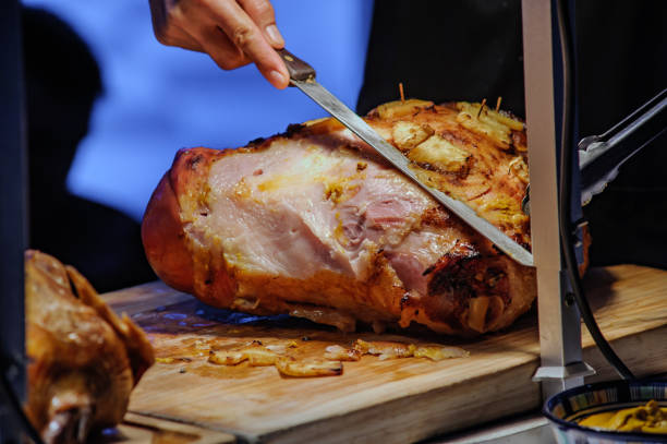 istock roasted ham pork with juicy pices pinapple slice in party dinner 2193202685