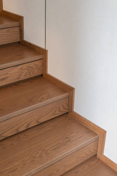 istock wooden stairs in a modern house interior 2193207169