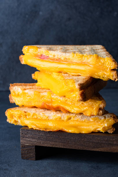 istock Arilled cheese sandwich. A sandwich made with melted cheddar cheese 2193207554