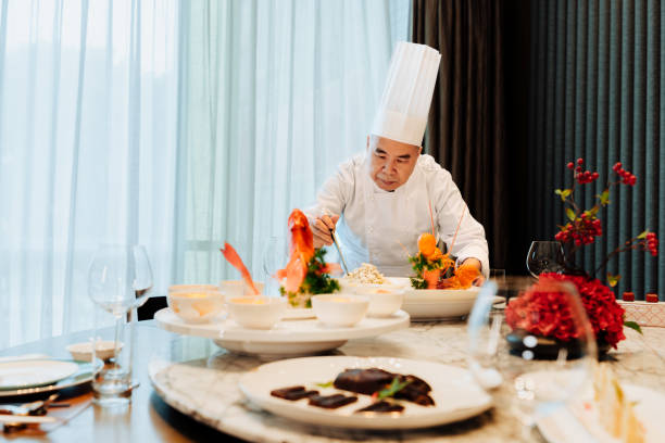 istock Senior chef proudly presenting the lobster. 2193214202