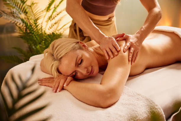 istock Mature Woman Receiving Relaxing Back Massage in a Spa 2193215155