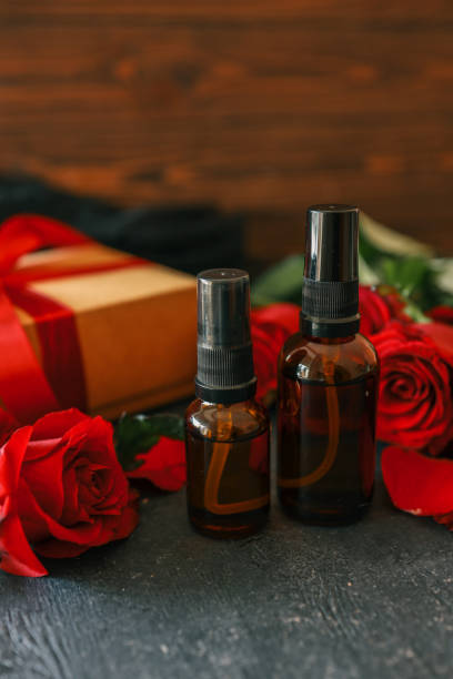 istock Gift box and cosmetic set with rose petals 2193215504