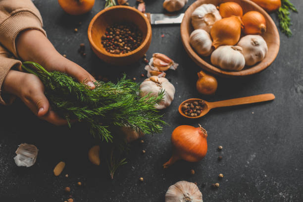 istock Girl holding dill in her hands, culinary concept 2193216811
