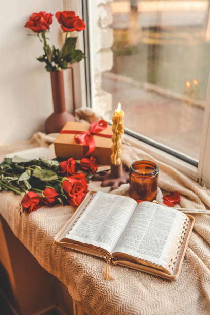 istock Open Bible in a cozy home interior. Good morning. 2193218104