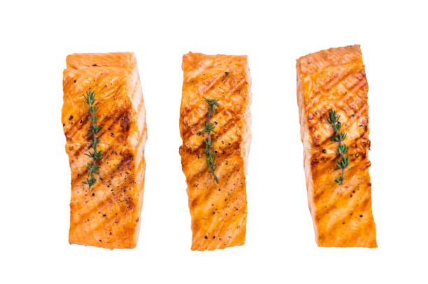 istock BBQ roast salmon fillet steak, roast fish isolated on white background. top view 2193220963