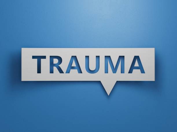 istock Speech Bubble block with TRAUMA business word.Minimalist Abstract Design With White Cut Out Paper.3D rendering on blue background. 2193222618