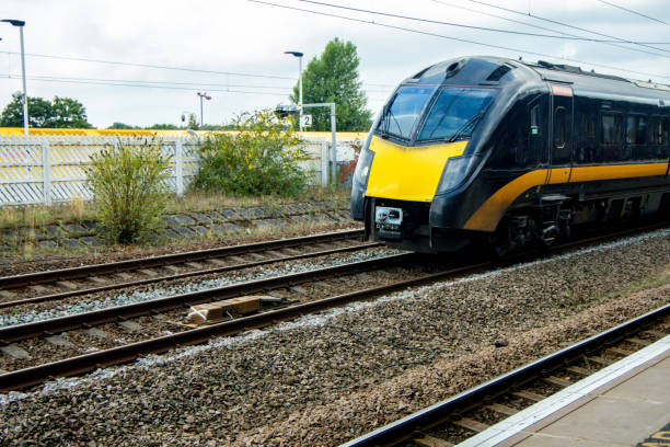 istock A Passenger Train Passing Over A Magnet Approaching A Railway Signal 2193222860