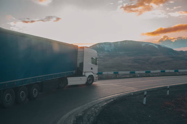 istock the road goes through the mountain. 2193223688