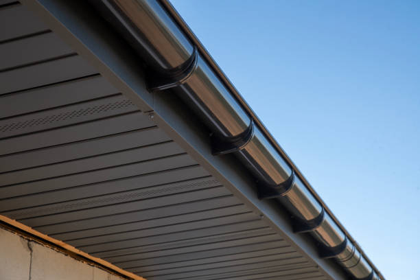 istock A house with a new rain gutter and a gray soffit 2193225636