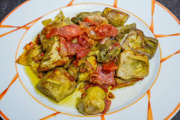 istock Fried artichokes with olive oil and ham 2193228916