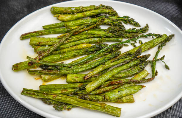 istock Grilled green asparagus with olive oil and salt 2193229010