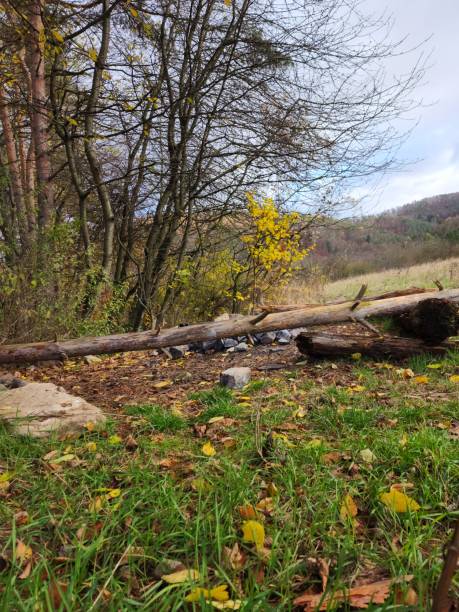 istock Autumn Landscape with a Campfire Spot in the Mountains 2193230022