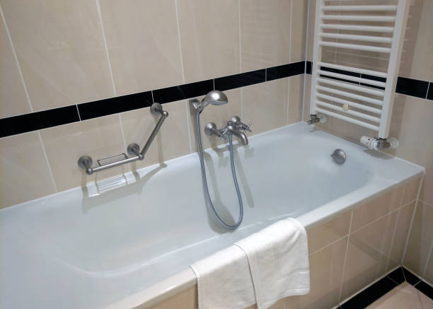 istock Modern Bathroom Interior with White Bathtub and Towel for Relaxation Design 2193233289