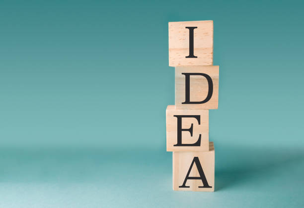 istock Stack of wooden blocks with the letters IDEA on top 2193233719