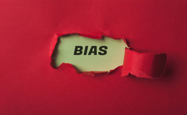istock Red paper with the word bias written on it 2193236925