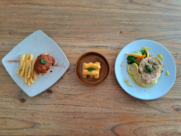 istock Chicken Peri Peri Is Marinated Herb Chicken With Spicy And Sour Sauce. Fried Battered Cheese Mozzarella Stick. Chicken Piccata With Chicken Steak, Lemon Butter And Capers Sauce. Food Menu. Top View. 2193237131