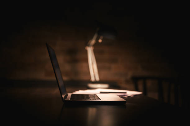 Close up of laptop at night.