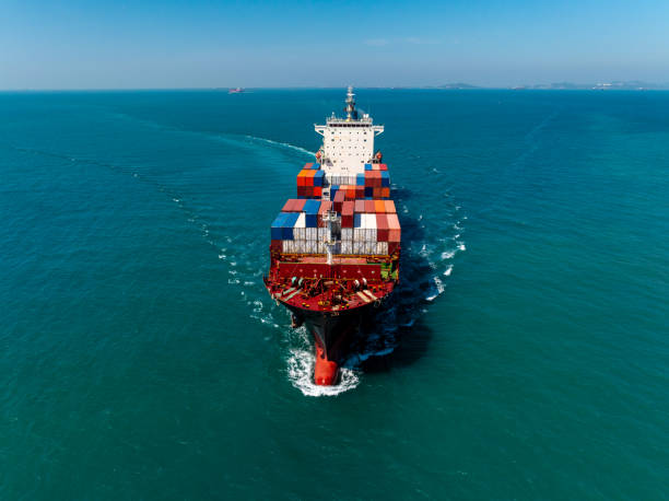 istock cargo logistic container ship sailing in sea, import export goods and distributing products to dealer and consumers across worldwide, container shiping service  concept. 2193237466