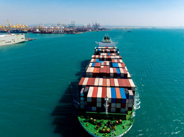 istock cargo logistic container ship sailing in sea, import export goods and distributing products to dealer and consumers across worldwide, container shiping service  concept. 2193237470