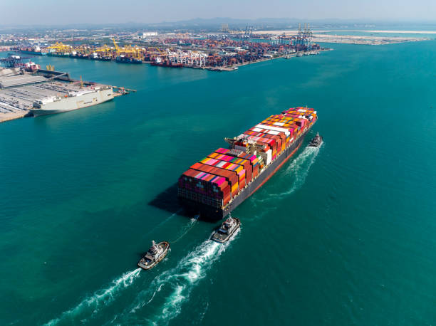 istock cargo logistic container ship sailing in sea, import export goods and distributing products to dealer and consumers across worldwide, container shiping service  concept. 2193237493