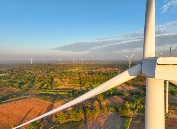 istock Wind energy and sustainable power generation with wind turbines, Eco-friendly solutions for renewable resources. Wind power farm and sustainable development of renewable energy, green technology. 2193237540