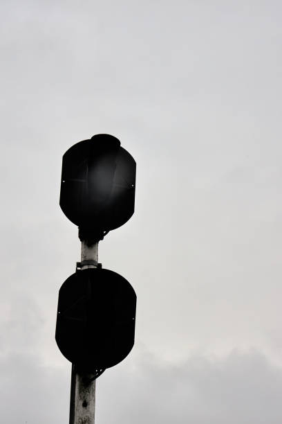 industrial landscape, black retro lantern against gray sky
