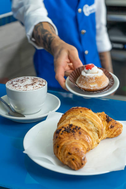 istock Coffee with breakfast served by the barista 2193238187