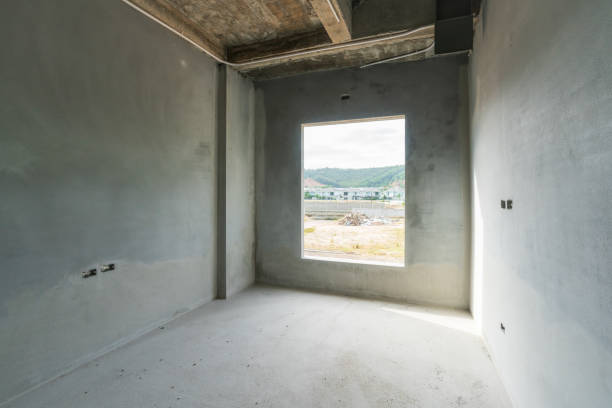 istock An unfinished room in a residential building that is currently under construction, featuring a window. 2193238495