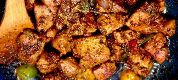 istock Spicy chicken stir-fry cooking in a wok 2193241752