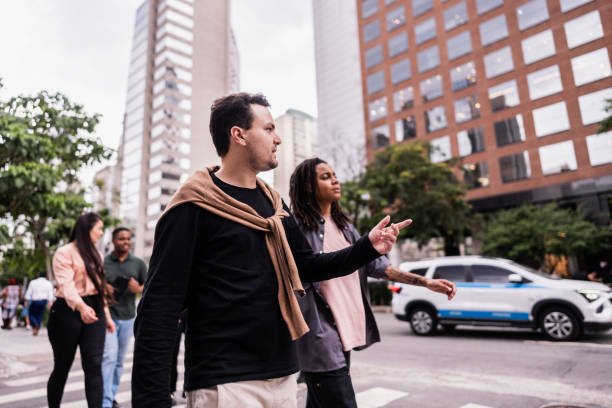 istock Coworkers walking and talking in the city 2193242436