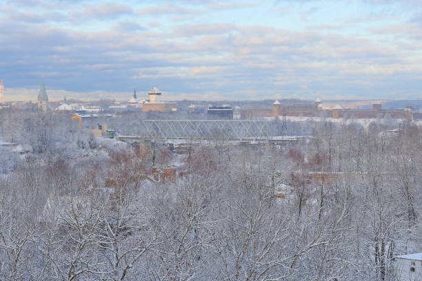 A captivating Winter Wonderland features a breathtaking snowcovered landscape under a cloudy sky