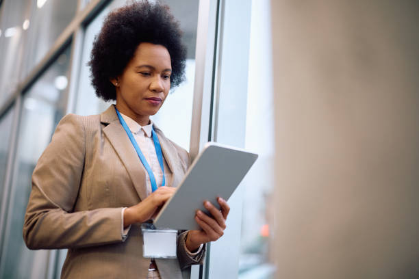 istock Black female manager working on digital tablet in the office. 2193247465