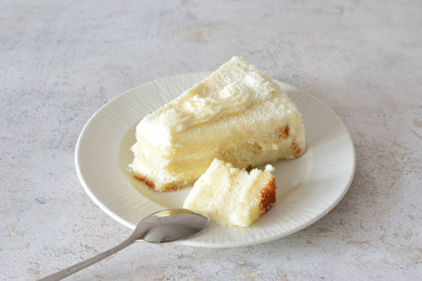 istock a cream cake with coconut and biscuit isolated on the saucer 2193247931