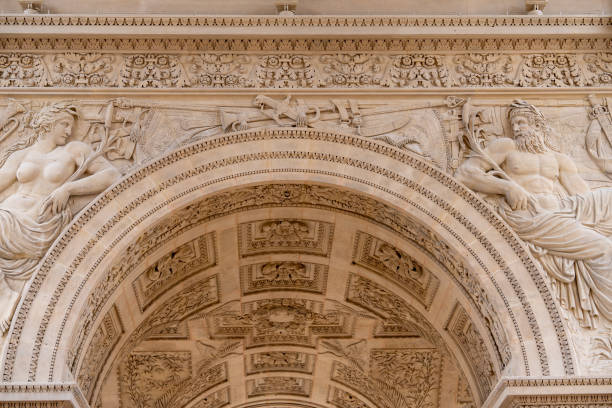 istock Intricate details of classical sculptures at a historical arch from ancient architecture in a historic city 2193252995